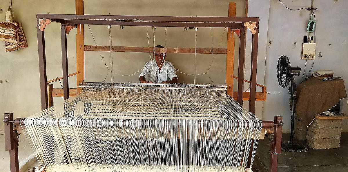 Siju Naran Mandan working on a loom in Bhujodi. PHOTOS BY AUTHOR