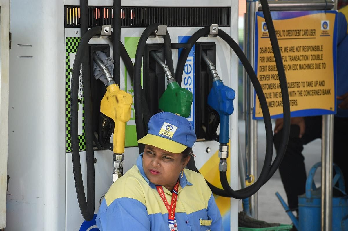 Petrol price was on Sunday hiked by 27 paise to Rs 73.62 a litre in the Delhi market -- the benchmark for national rates, according to a price notification by state-owned oil firms. Photo/PTI