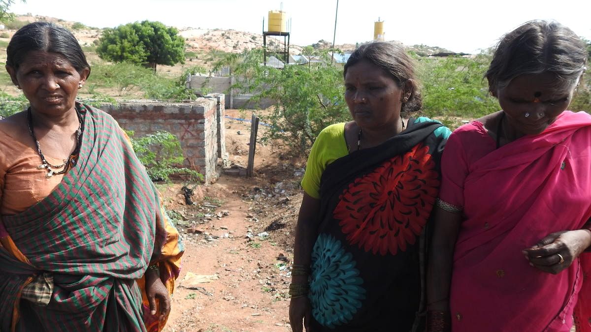 Women near the common toilet facility in P K Halli, Ballari district; Pemmanahalli Gollarahatti in Pavagada taluk, Tumakuru district, where Chitradurga MP A Narayanaswamy (inset) was not allowed to enter because of his caste. dh photos/anitha pailoor