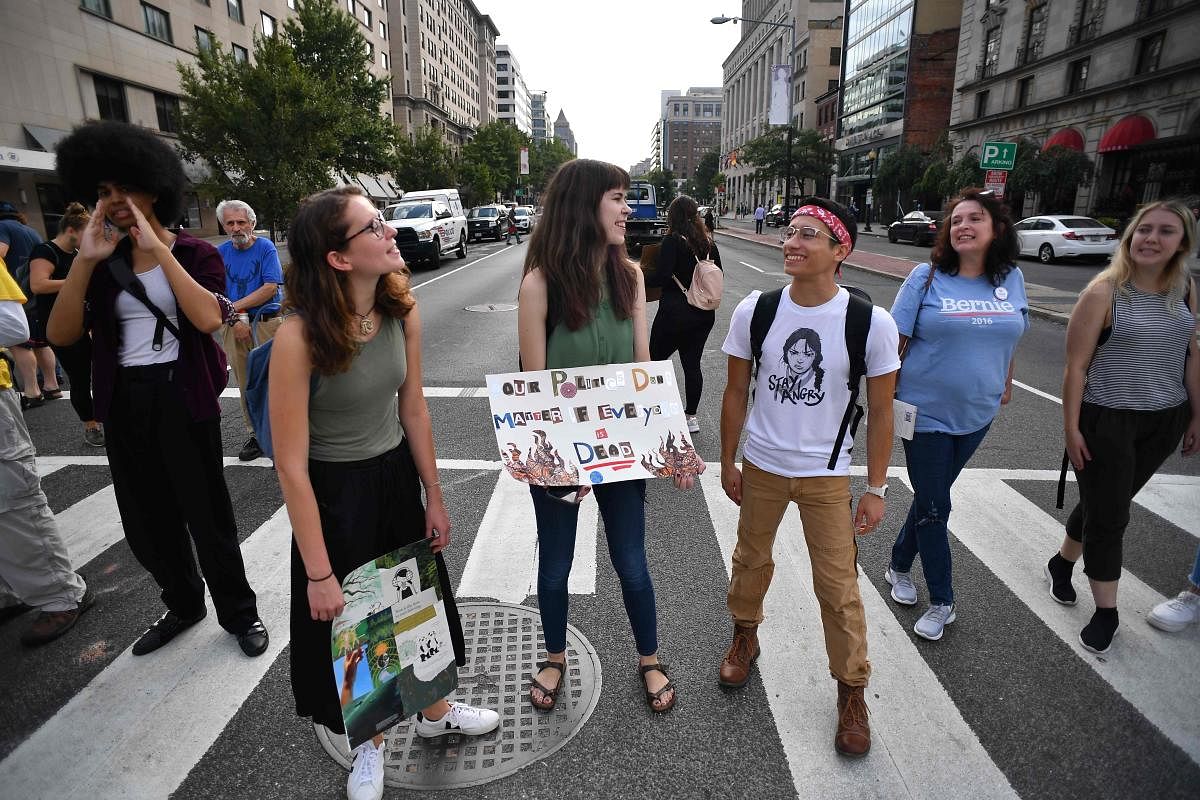 Environmental activists gather to protest to shut down the city during global climate action week on September 23, 2019 in Washington, DC. Reuters
