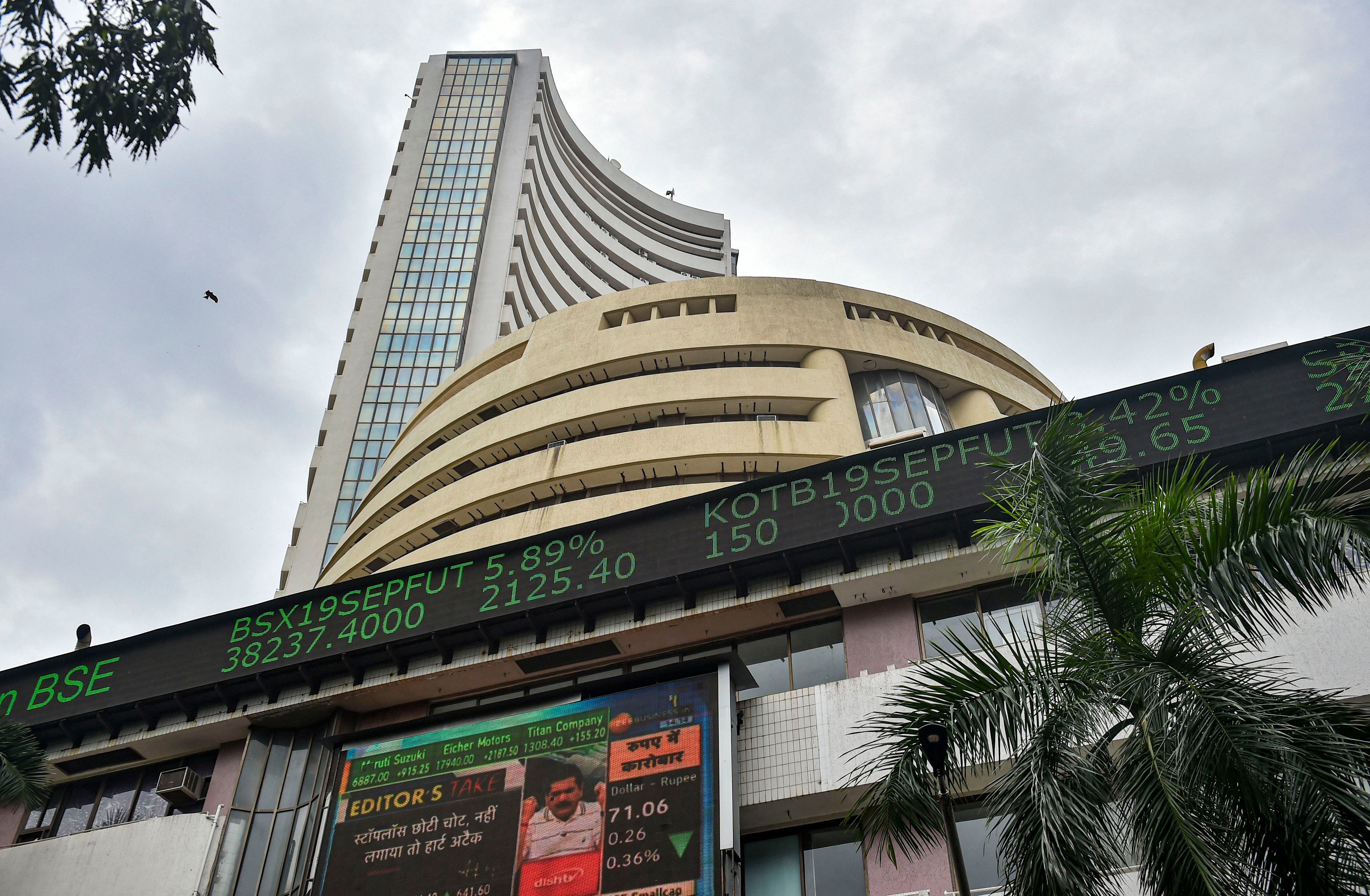 Stock prices displayed on a digital screen outside BSE building, in Mumbai. (PTI Photo)