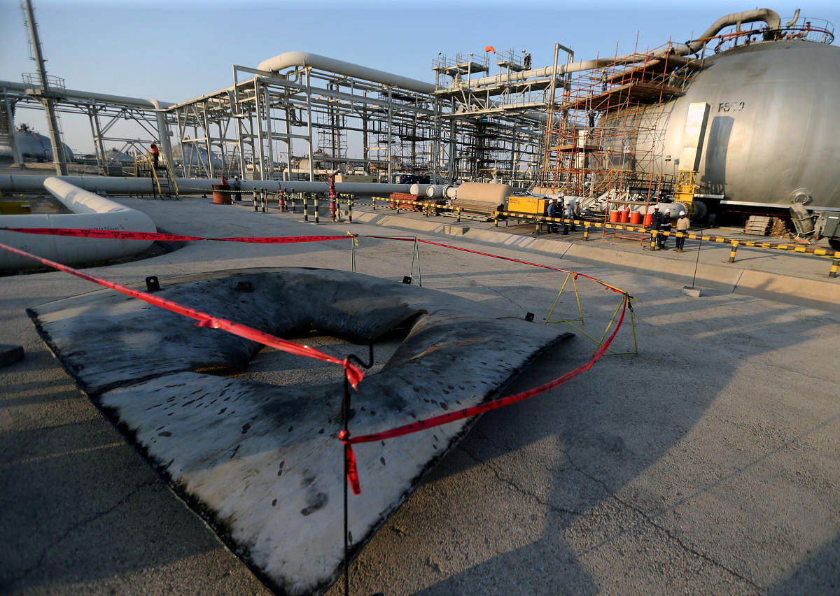 Metal part of a damaged tank is seen at the damaged site of Saudi Aramco oil facility in Abqaiq, Saudi Arabia, September 20, 2019. (REUTERS File Photo)
