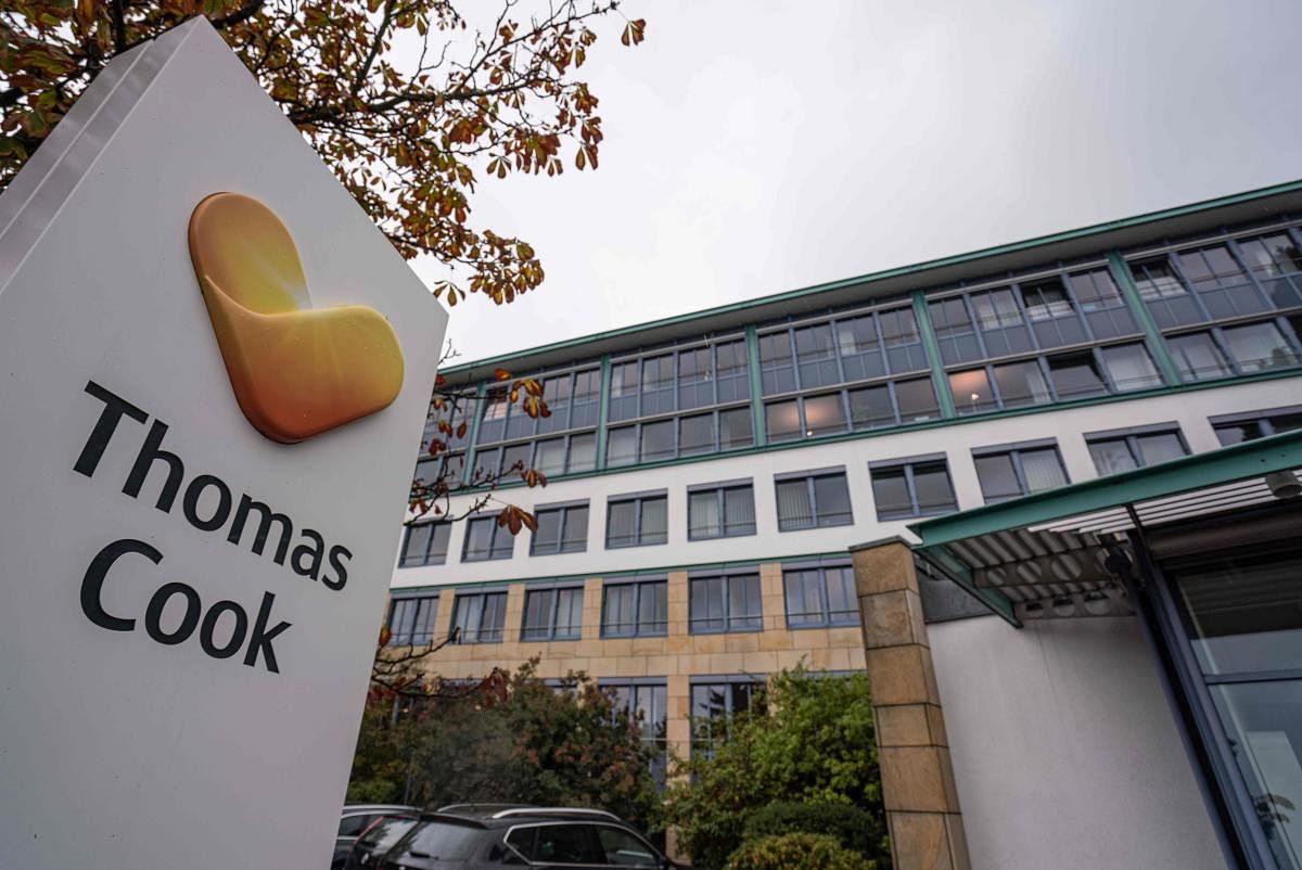 The company's logo is pictured in front of the headquarters of the German arm of bankrupt British tour operator Thomas Cook in Oberursel near Frankfurt am Main, western Germany. (Photo by AFP)