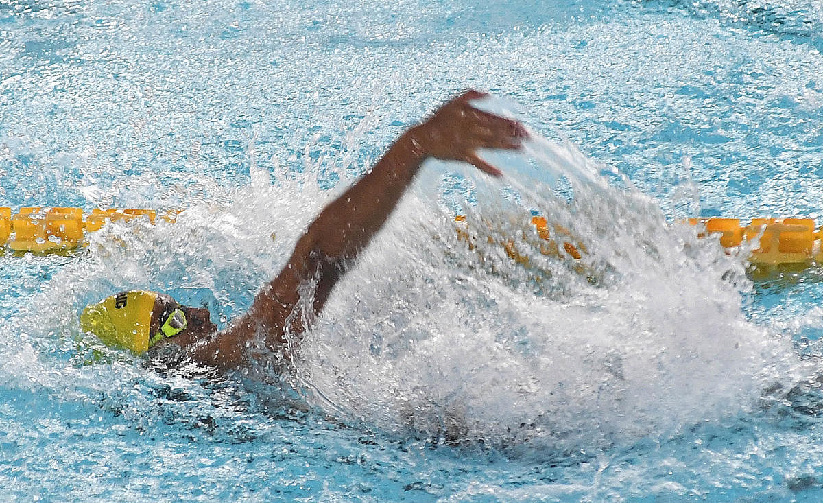 India's Srihari Nataraj powers to victory in the men's 100M backstroke event in a record-breaking time of 55.89 seconds on Thursday. DH PHOTO/ SRIKANTA SHARMA R