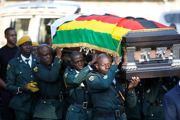 The body of former Zimbabwean President Robert Mugabe arrives at his rural home in Kutama. (Photo/Reuters)