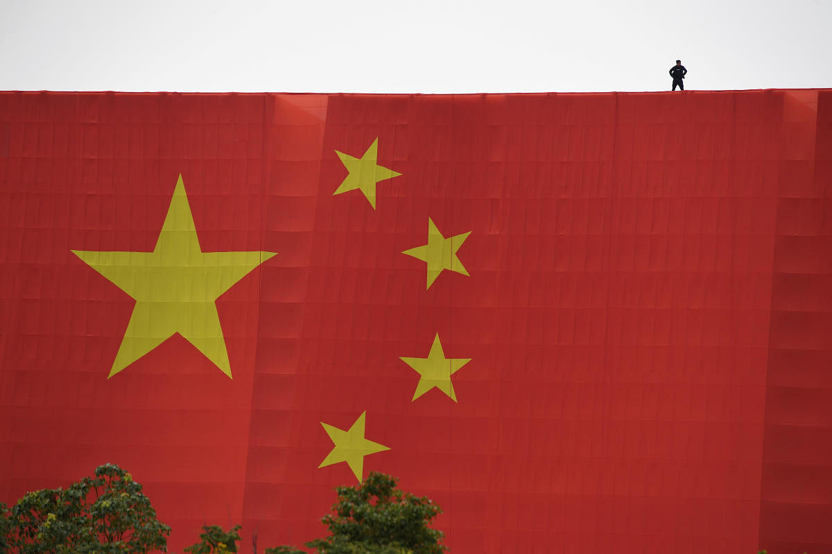 China has been cracking down on financial risk and its firms are dogged by accusations of account manipulation. Photo/Reuters