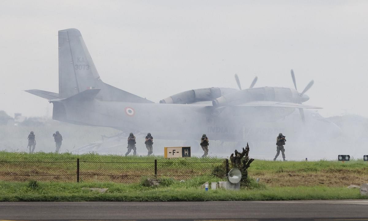 IAF's Garud Commando Force rehearse in the backdrop of AN-32 aircraft for the upcoming Air Force Day, which is to be held on October 08, in Vadodara, Friday, Sept. 27, 2019. (PTI Photo)