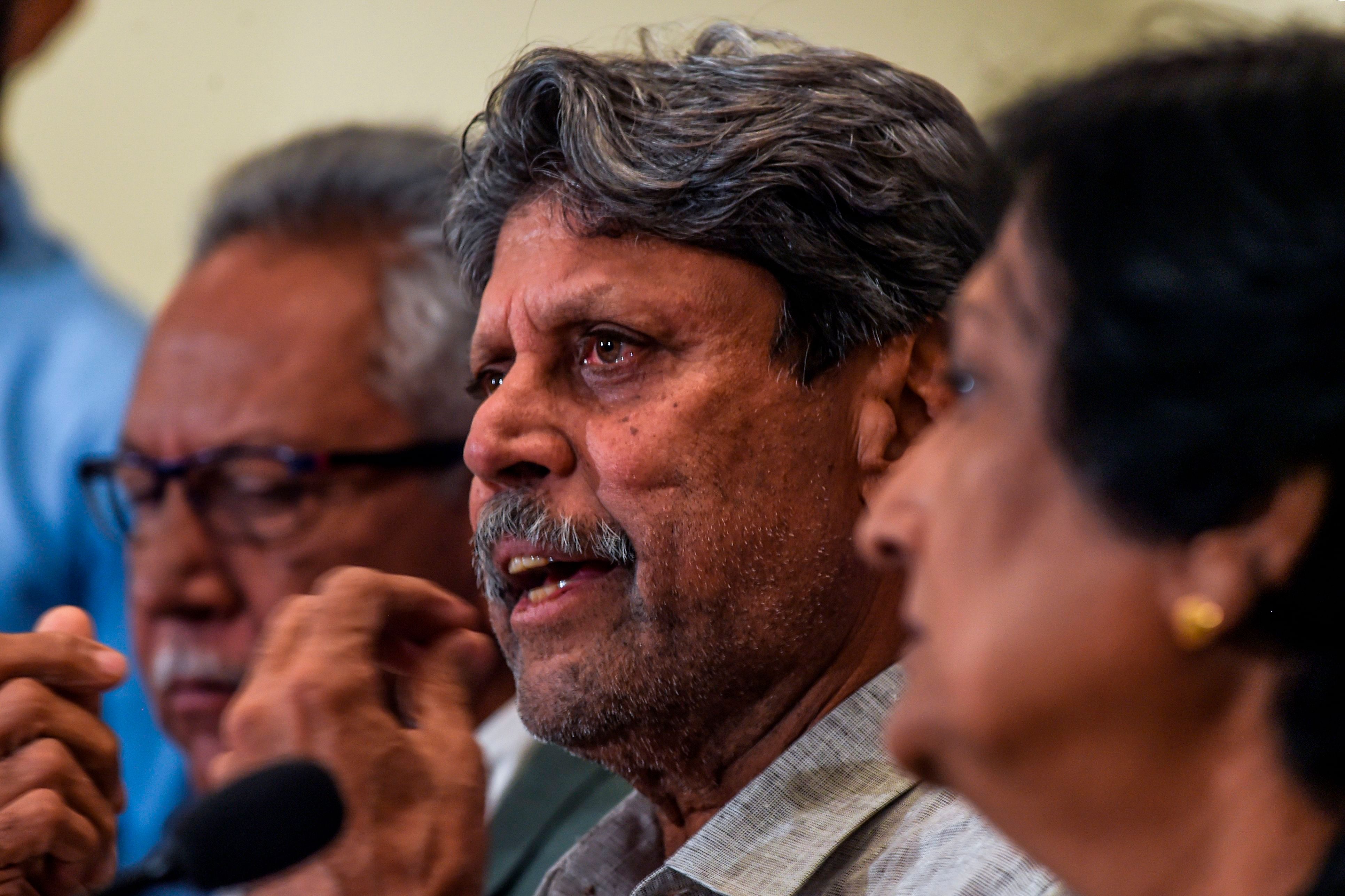 The three-member cricket advisory committee panel, ex-national coach Anshuman Gaekwad (L) and ex-women's team captain Shantha Rangaswamy and Kapil Dev. (AFP Photo)