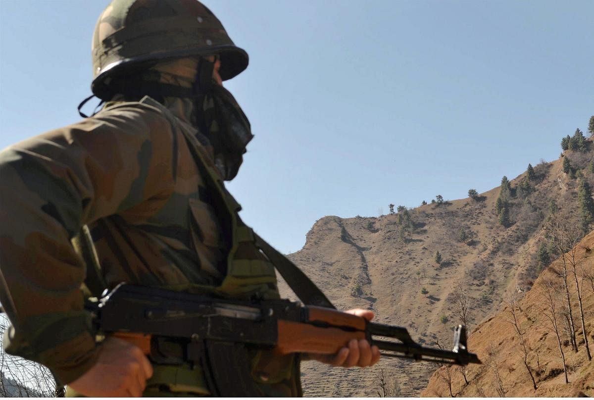 An army jawan keeps vigil in Poonch district of Jammu and Kashmir. (PTI Photo)