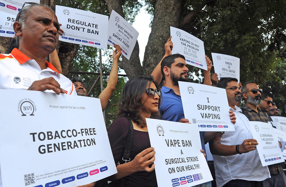 Members of the Association of Vapers India held a protest, demanding that the ban on e-cigarettes be withdrawn, at Freedom Park in Bengaluru on Saturday. DH Photo