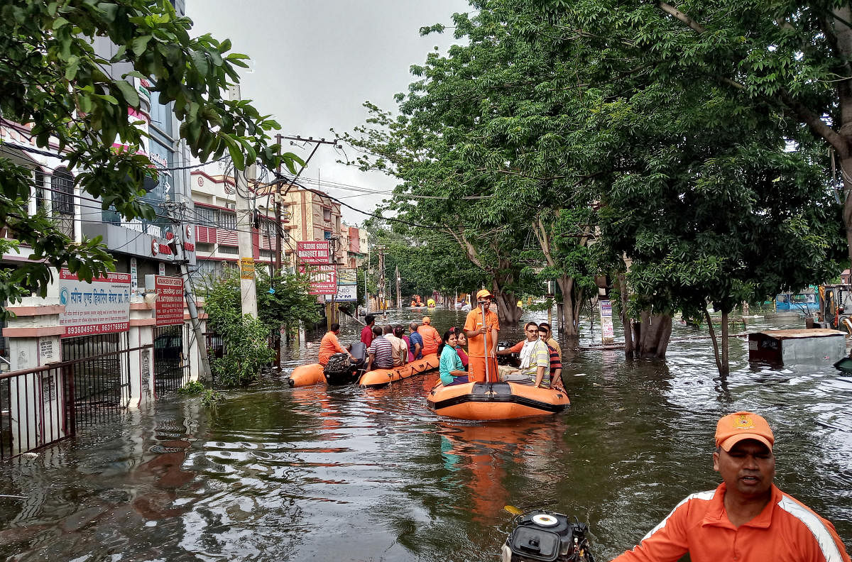 Rescue members evacuate people from a flood-affected neighbourhood in Patna, in the eastern state of Bihar, India, October 1, 2019. REUTERS image
