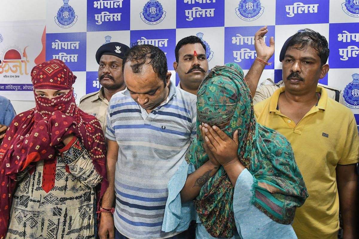 Police present four persons arrested in connection with an alleged honey-trapping case in Bhopal, Tuesday, Sept. 24, 2019. Photo/PTI
