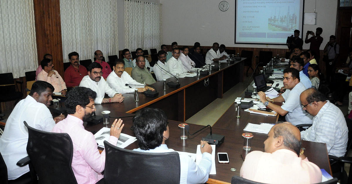 Minister for Tourism, Kannada and Culture C T Ravi speaks at a review meeting held at DC's office in Manipal.
