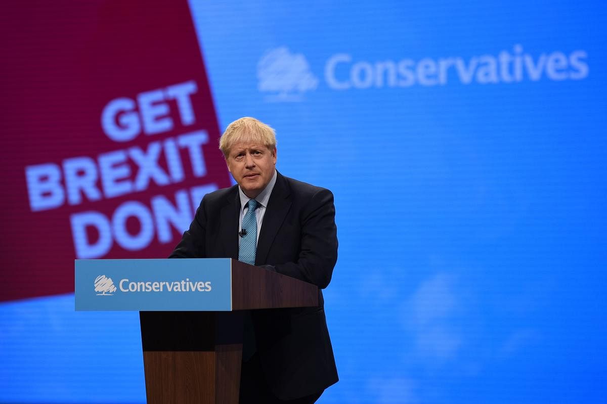 Britain's Prime Minister Boris Johnson delivers his keynote speech to delegates on the final day of the annual Conservative Party conference at the Manchester Central convention complex, in Manchester, north-west England on October 2, 2019. Photo/AFP