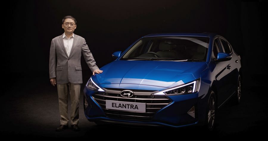 Hyundai Motor India MD and CEO SS Kim with the 2019 Elantra.