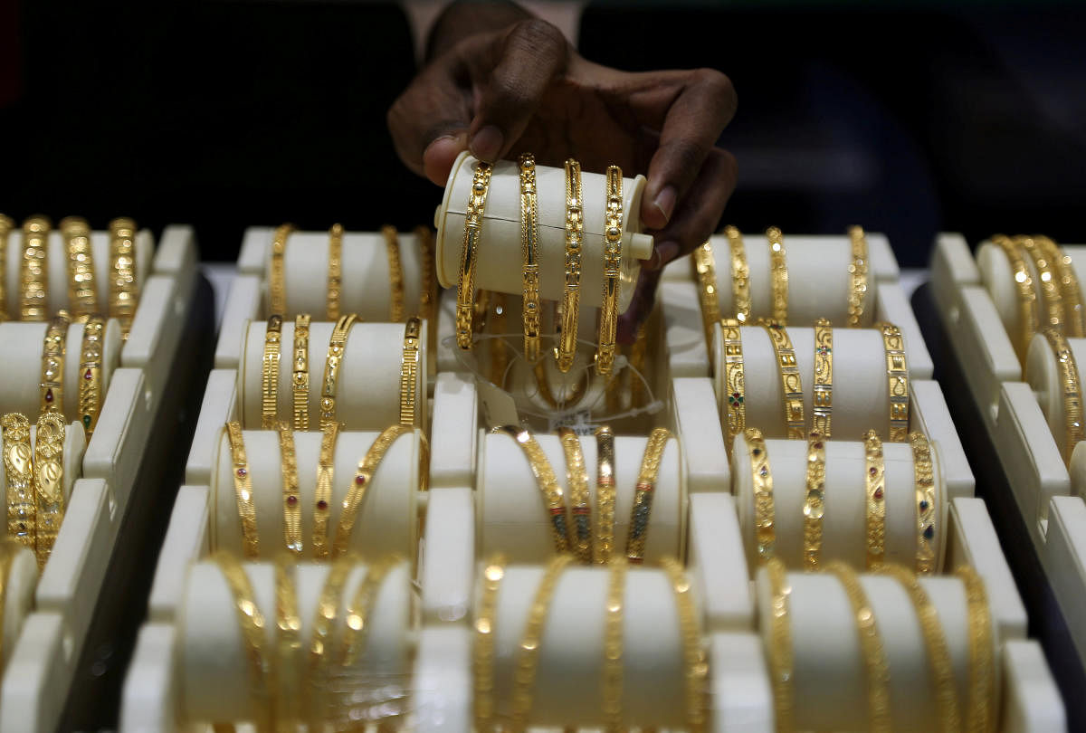 In the global market, gold was ruling higher at USD 1,501 per ounce in New York, while silver was trading at USD 17.61 an ounce. (Reuters File Photo)