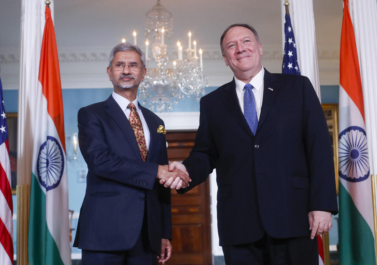 Secretary of State Mike Pompeo, right, shakes hands with Indian counterpart Subrahmanyam Jaishankar, left, at the US State Department in Washington. (Photo by AP/PTI)