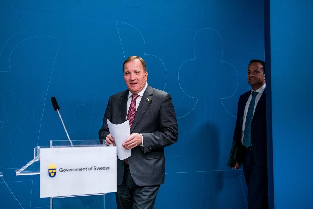 Swedish Prime Minister Stefan Lofven (L) and Ireland's Taoiseach, prime minister, Leo Varadkar arrive to give a press conference following a meeting on October 3, 2019 in Stockholm. (AFP)