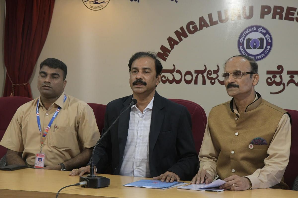 KIOCL Chairman and Managing Director M V Subba Rao (centre) speaks to reporters in Mangaluru.