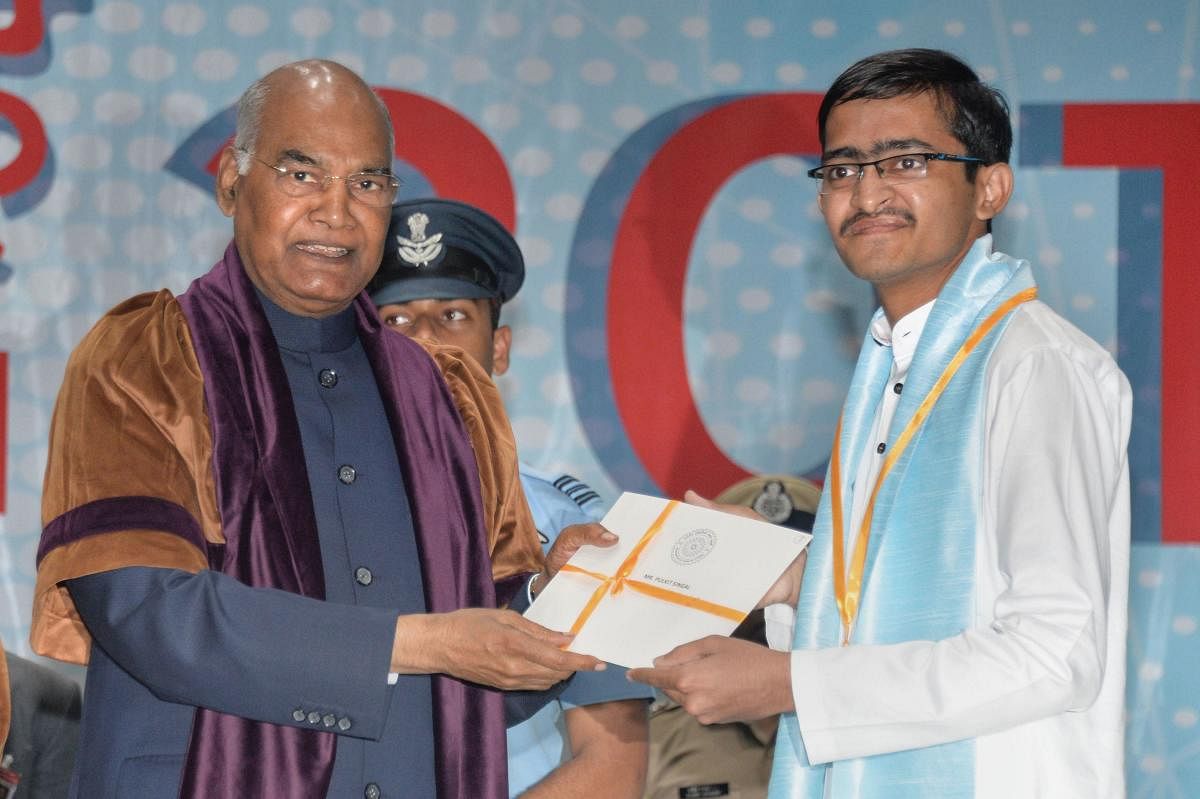 President Ram Nath Kovind presents degree certificate to student at the annual convocation of Indian Institute of Technology Roorkee onFriday. (RB/PTI Photo)