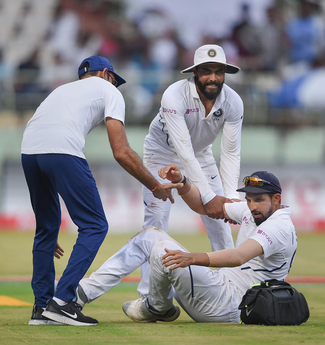 India's Ishant Sharma being helped after he suffered from an injury on third day of the 1st cricket test match between India and South Africa at Dr YS Rajasekhara Reddy ACA-VDCA Cricket Stadium, in Visakhapatnam. (PTI photo)