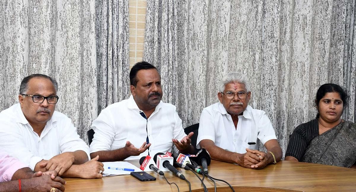 Mangalore MLA U T Khader speaks at a press conference in Mangaluru on Friday.