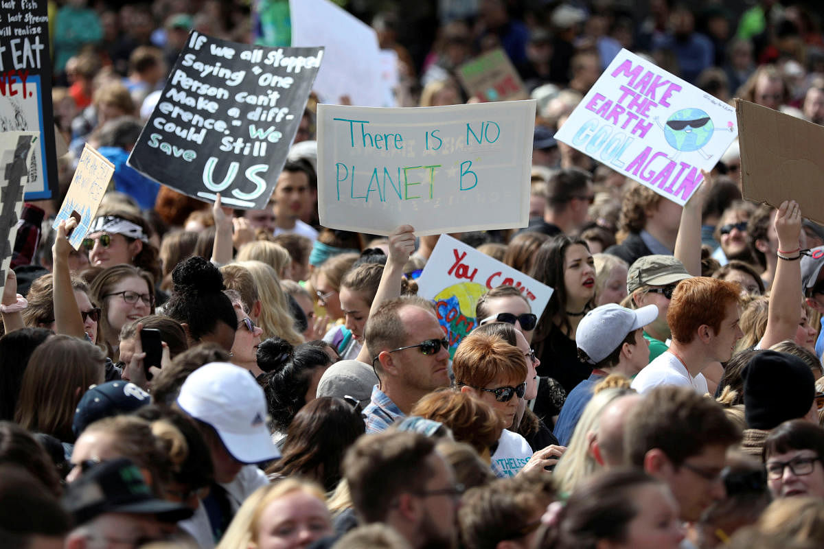 People participate in a climate strike rally. (Reuters File Photo)