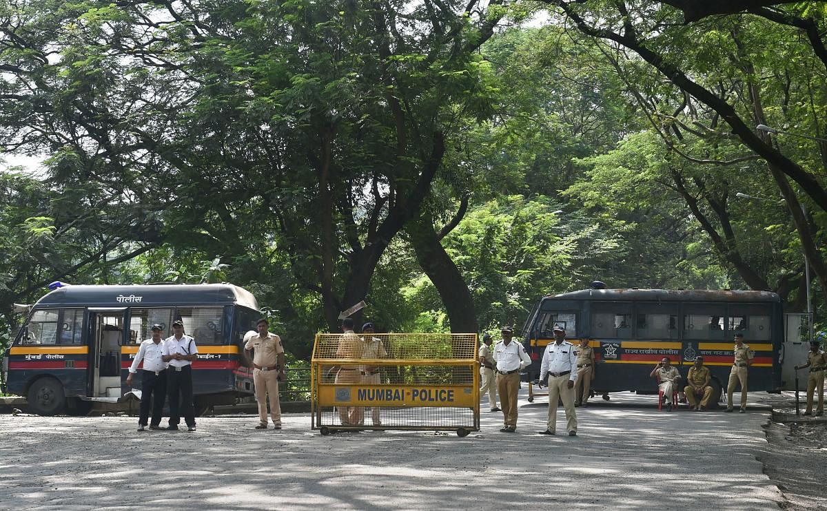 Police cordon off the area following a protest against the tree-cutting, being carried out for the Metro car shed project, at Aarey colony in Mumbai on Saturday. (PTI Photo)