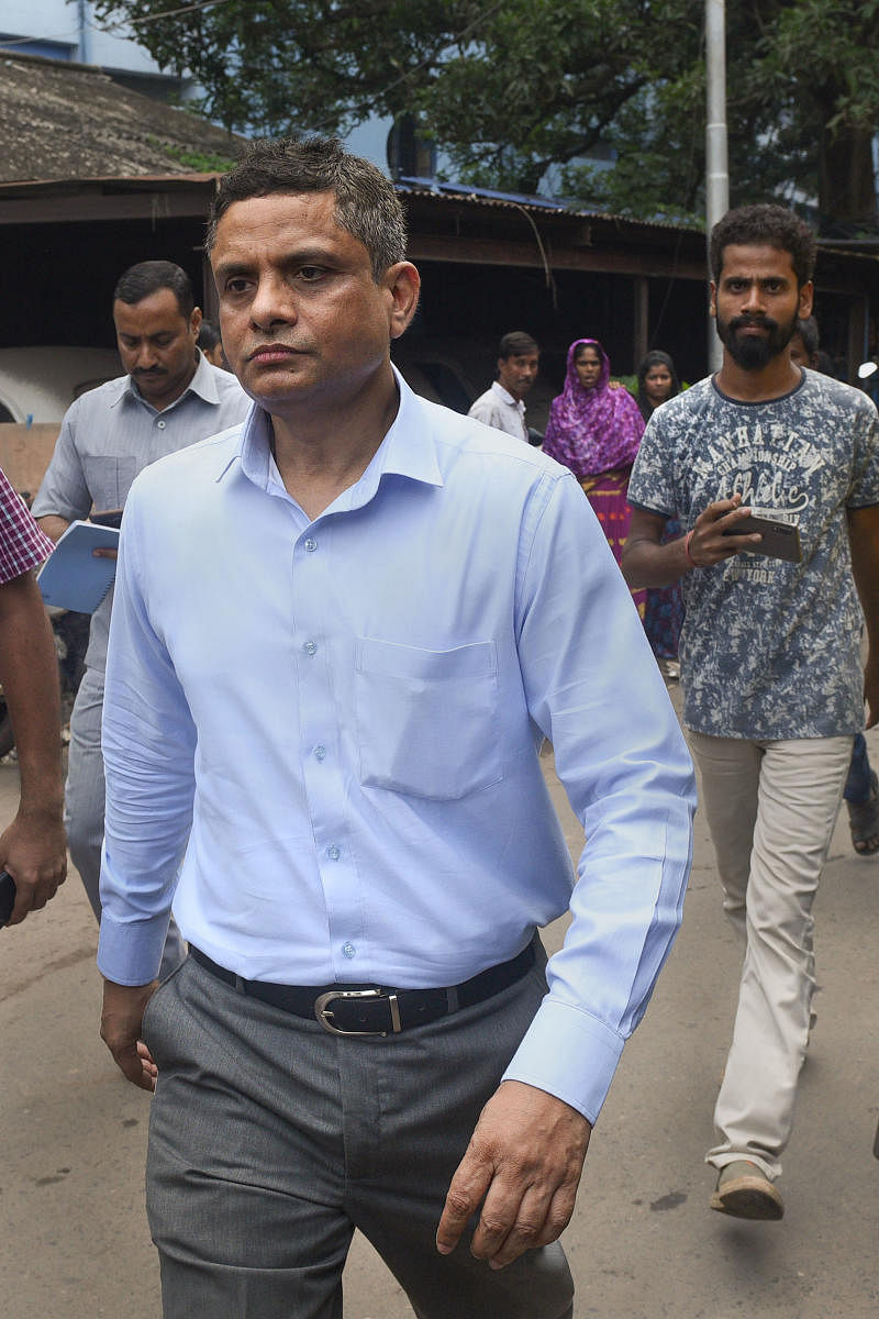 Former Kolkata Police Commissioner Rajeev Kumar appears before the Alipore court in connection with the Saradha scam case, in Kolkata, Thursday, Oct. 3,2019. The court granted him bail in the case on the basis of two bonds for Rs 50,000 each. (PTI Photo)