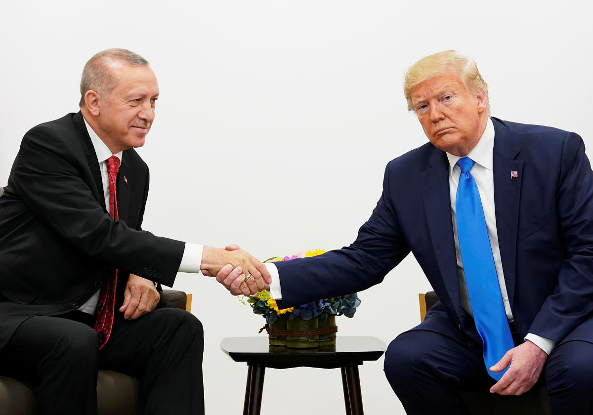 U.S. President Donald Trump shakes hands during a bilateral meeting with Turkey's President Tayyip Erdogan. (Reuters File Photo)