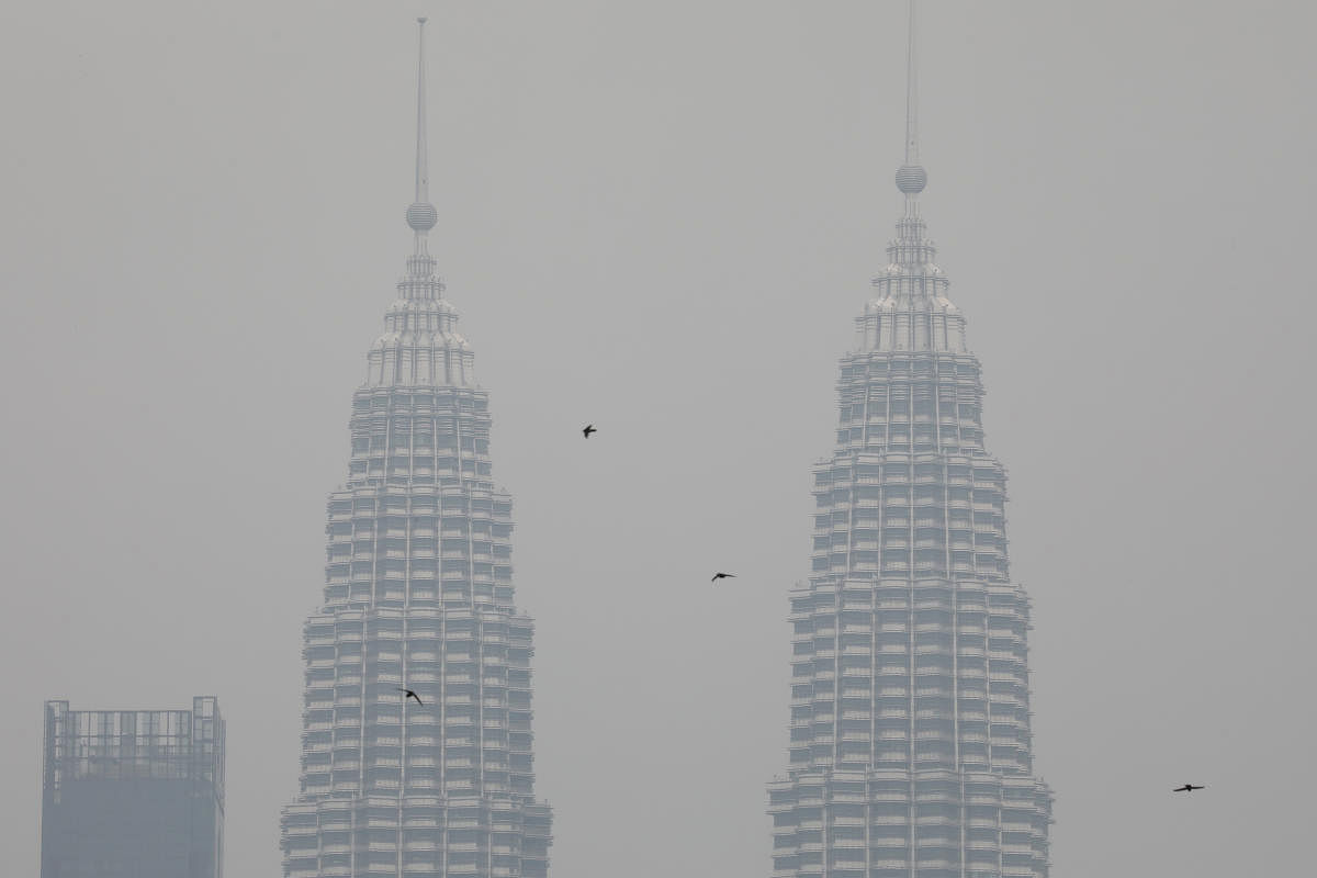 Malaysian authorities have imposed fines of around USD 100 million on 80 entities. (Reuters Photo)