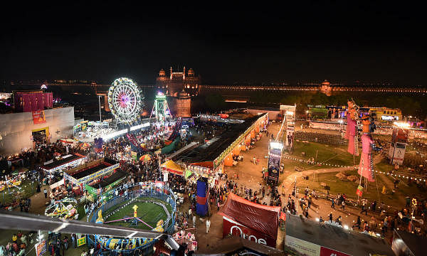 A view of ongoing Dussehra Fair at Red Fort as effigies of demon king Ravana and his brothers Kumbhkaran and Meghnad being installed on the eve of Dussehra festival, near Red Fort in New Delhi. (PTI photo)