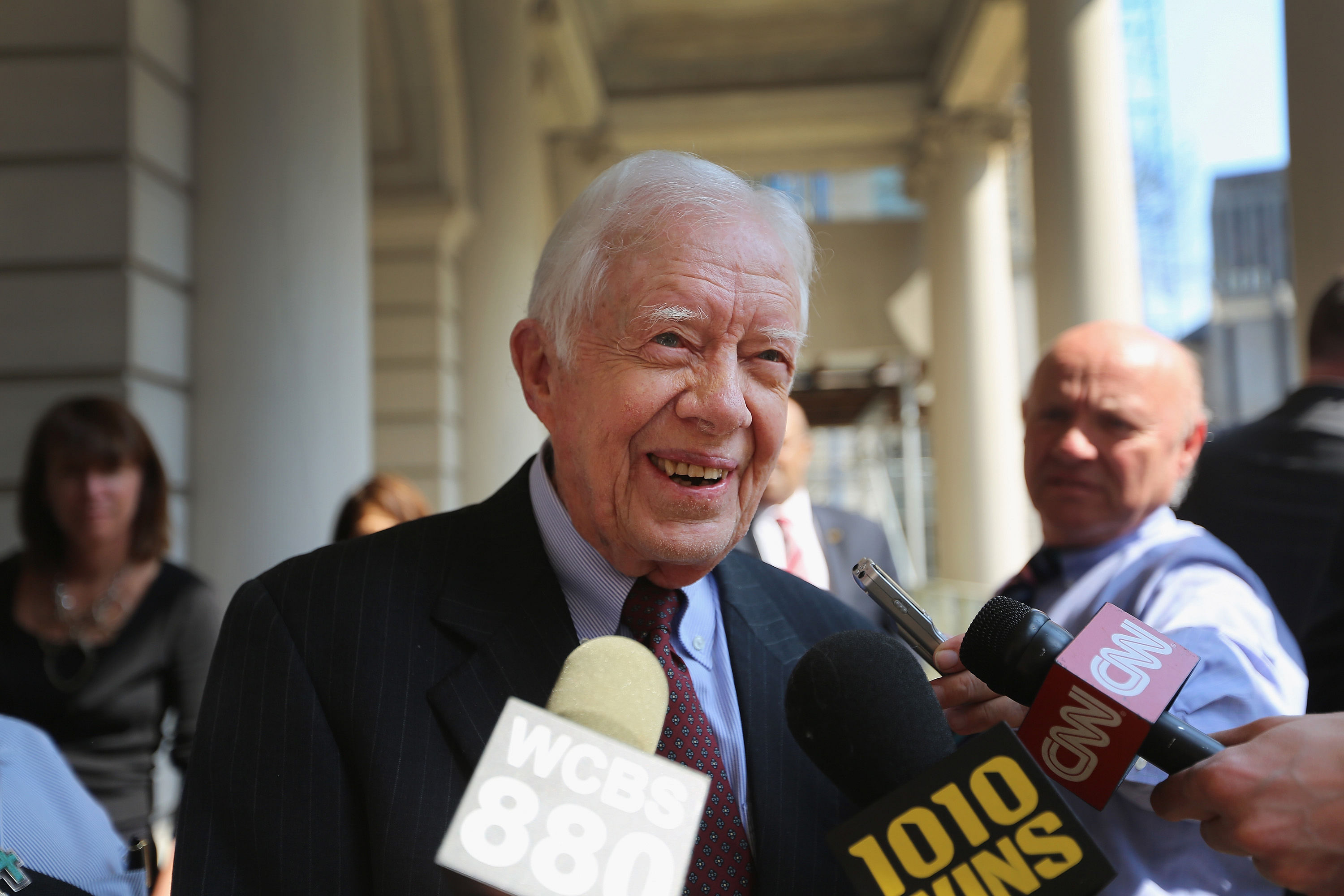 Gormer US President Jimmy Carter speaks to the media at City Hall. (AF Photo)