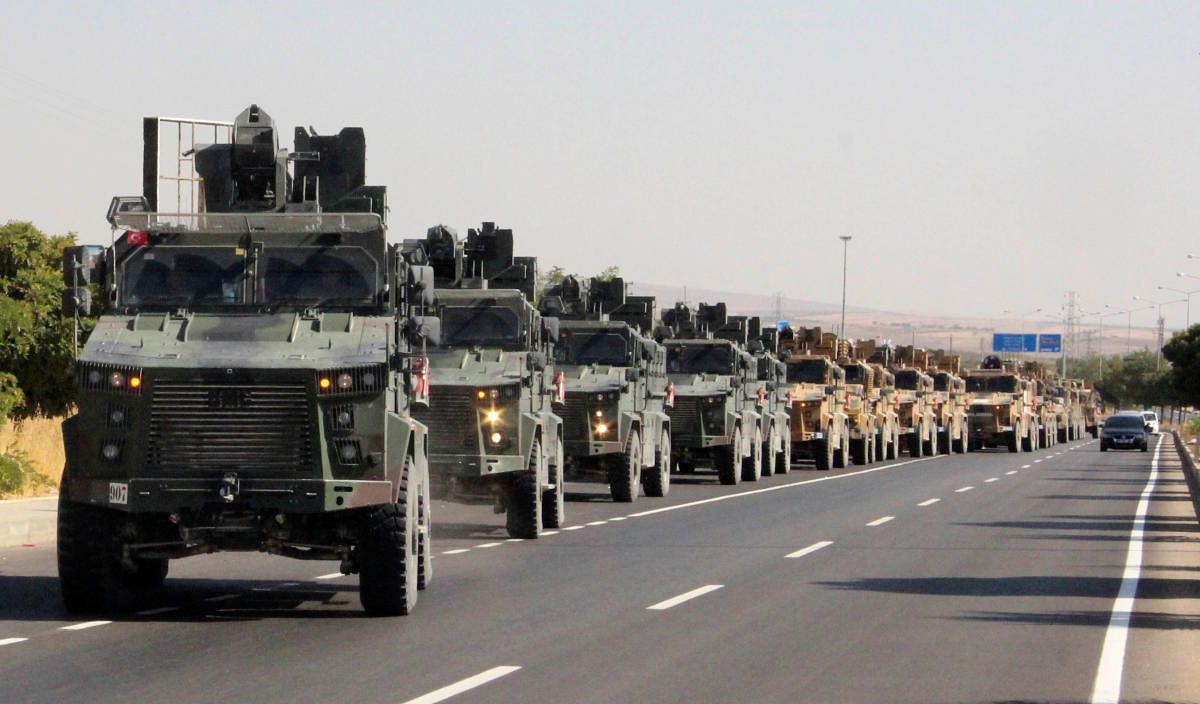 A Turkish miltary convoy is pictured in Kilis near the Turkish-Syrian border, Turkey, October 9, 2019. (Mehmet Ali Dag/ Ihlas News Agency (IHA) via REUTERS)