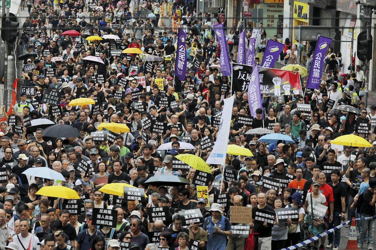 The Communist Party alleged that a transport app available on Apple's store helped protesters identify police in Hong Kong. Photo/AFP