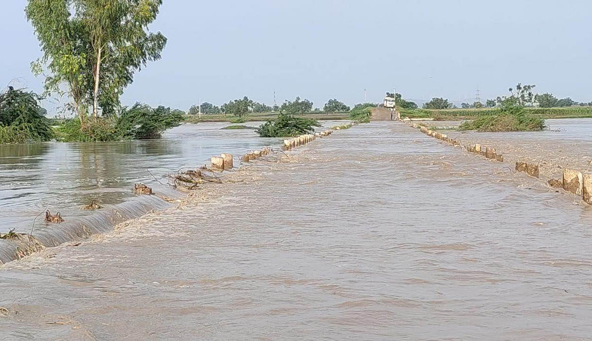The overflowing Bennehalla stream near Yavagal brought the traffic on the busy Nargund-Ron stretch to a standstill on Wednesday. The stream is in spate following heavy showers in the last few days.