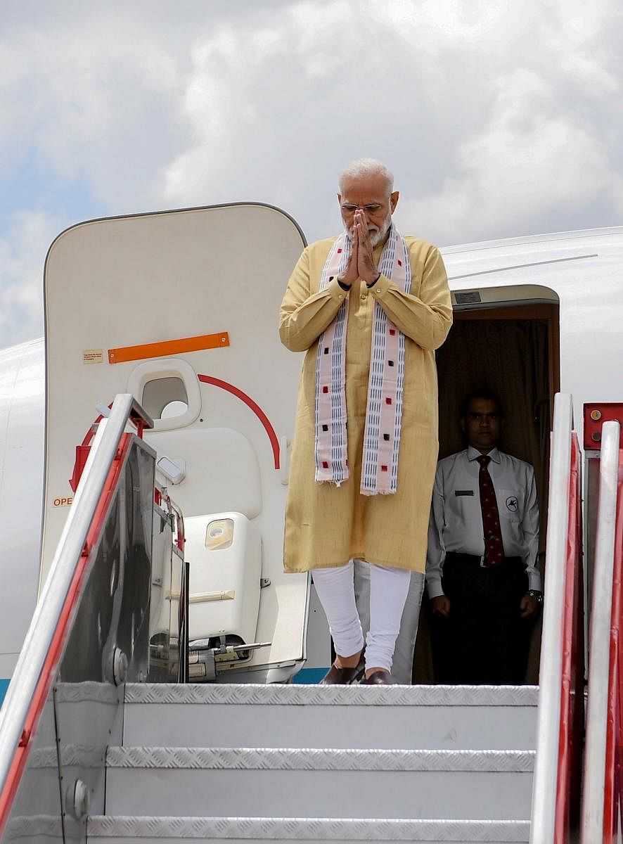 Primer Minister Narendra Modi gestures as he arrives in Chennai, ahead of a summit with his Chinese counterpart President Xi Jinping. AFP Photo