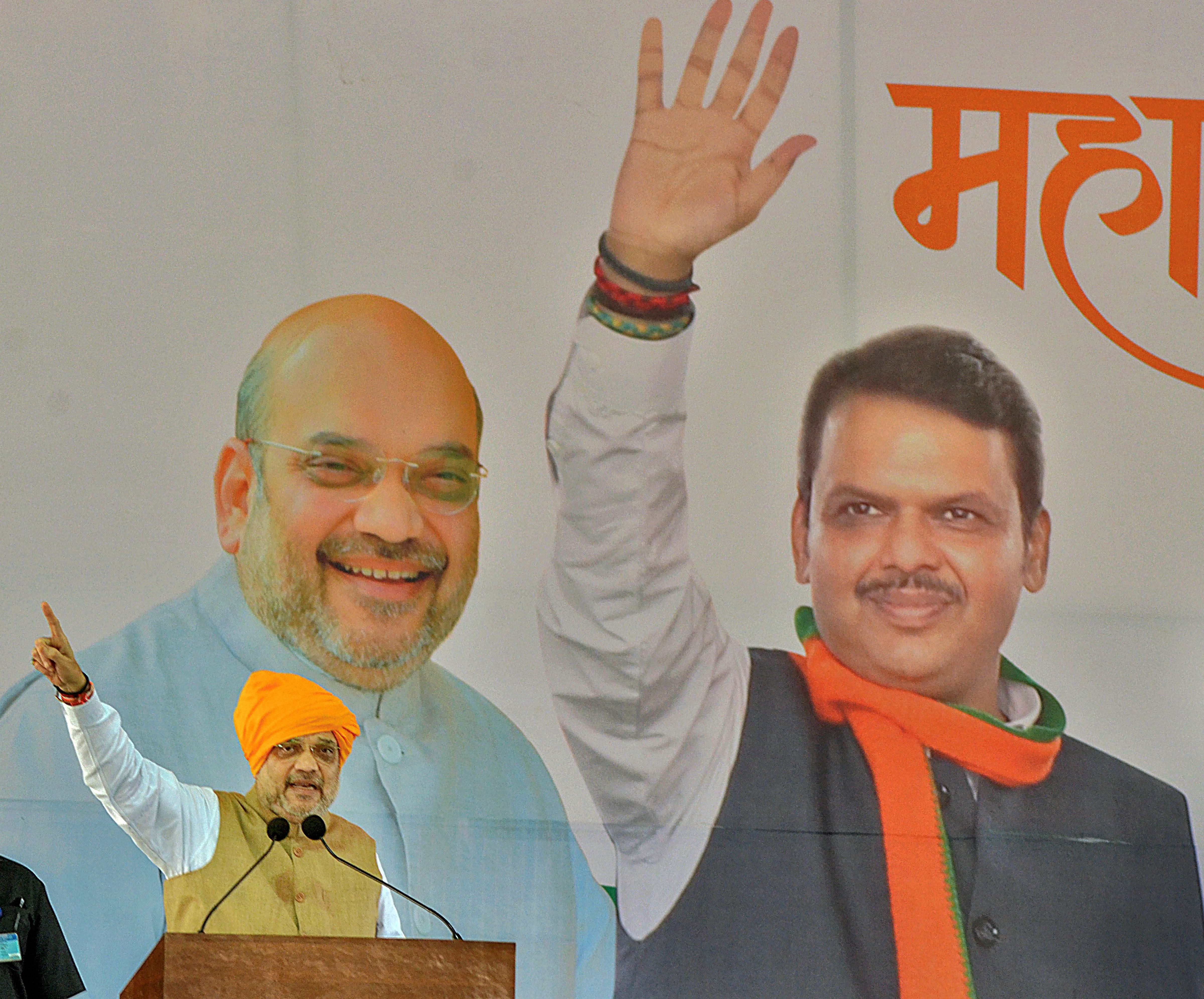 Home Minister Amit Shah addresses his supporters during a rally ahead of Maharashtra's assembly election, at Jath in Sangli district of Maharashtra. (PTI Photo)