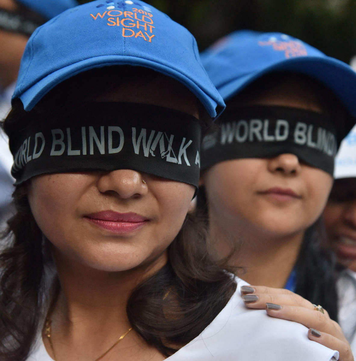 Participants at the World Blind Walk from St Joseph School to Brigade road (Samson) circle organised by Y’ S Men International in Bengaluru on Thursday, 10 October, 2019. Photo by Janardhan B K