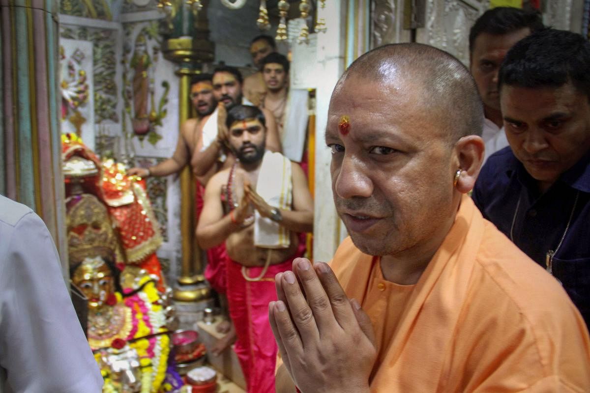 Uttar Pradesh Chief Minister Yogi Aditynath visits Mumbadevi temple, in Mumbai, Thursday, Oct. 10, 2019. (PTI Photo)