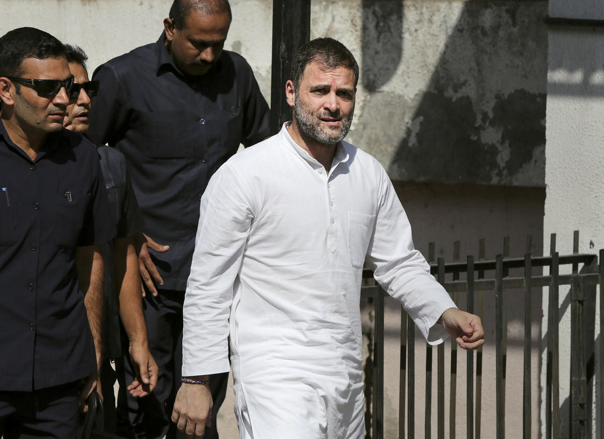  Congress leader Rahul Gandhi arrives in local courts in connection with two criminal defamation suits filed against him, in Ahmedabad, Friday, Oct. 11, 2019. Rahul Gandhi pleaded not guilty in defamation suit filed against him for calling senior BJP leader Amit Shah a murder accused. PTI