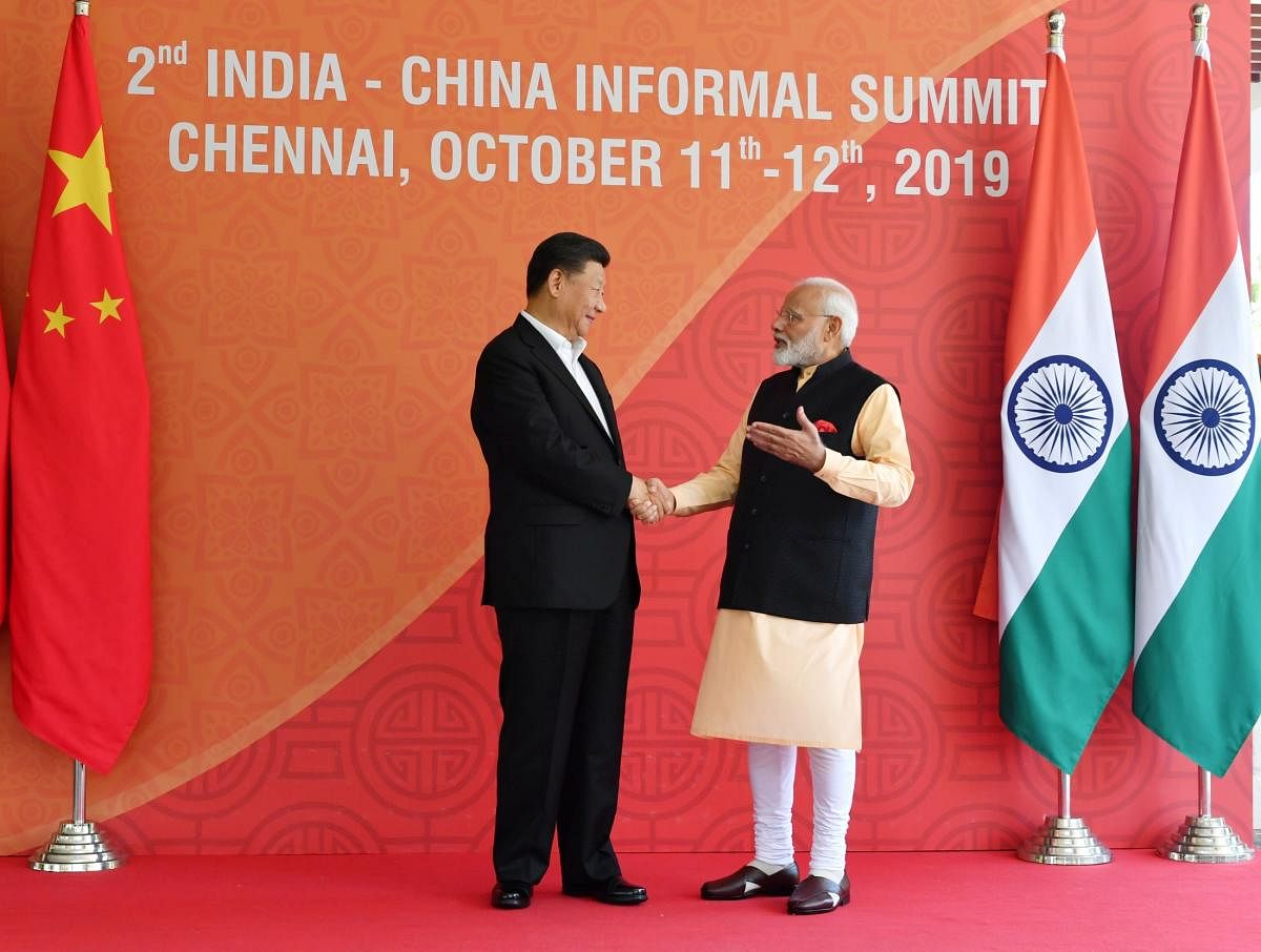 Xi Jingping and Narendra Modi during informal summit. (DH Photo)