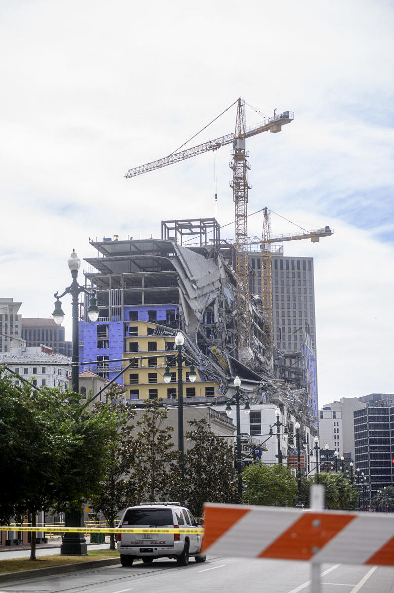 The Hard Rock Hotel partially collapsed onto Canal Street downtown New Orleans. (AFP Photo)
