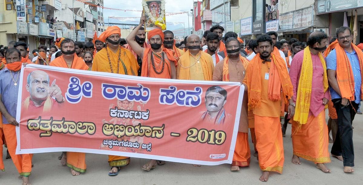 Sri Rama Sene leaders Pramod Muthalik, Gangadhar Kulakarni, Ranjith Shetty and others hold a silent protest in Chikkamagaluru on Sunday.