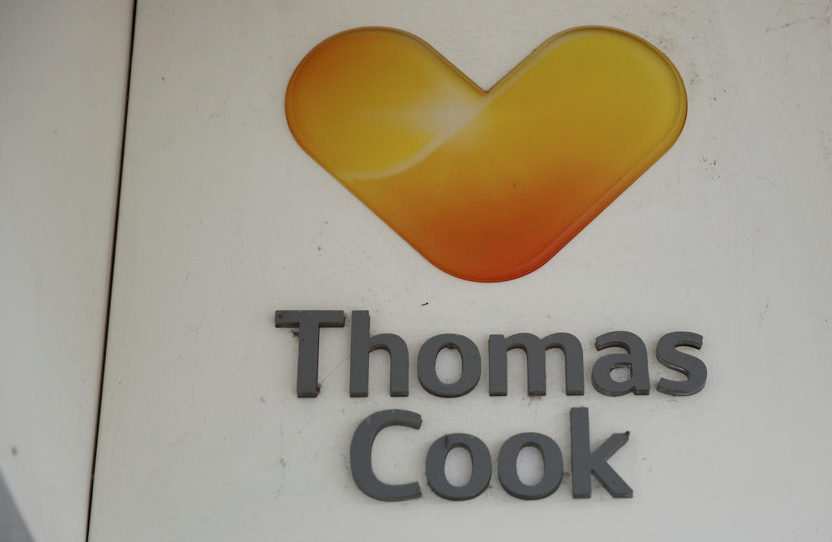 Signage is seen outside a closed Thomas Cook travel agents store near Manchester, Britain, October 9, 2019. REUTERS file photo