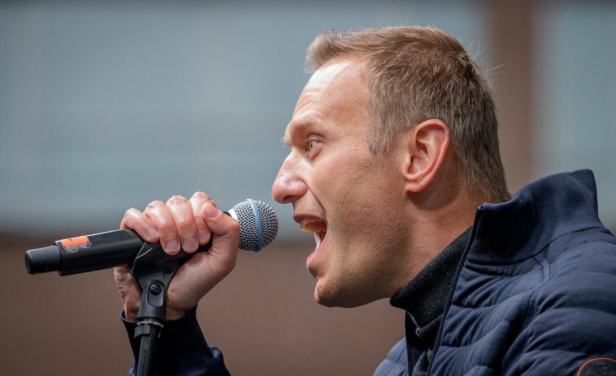 Russian opposition leader Alexei Navalny delivers a speech during a demonstration in Moscow. (Photo by AFP)