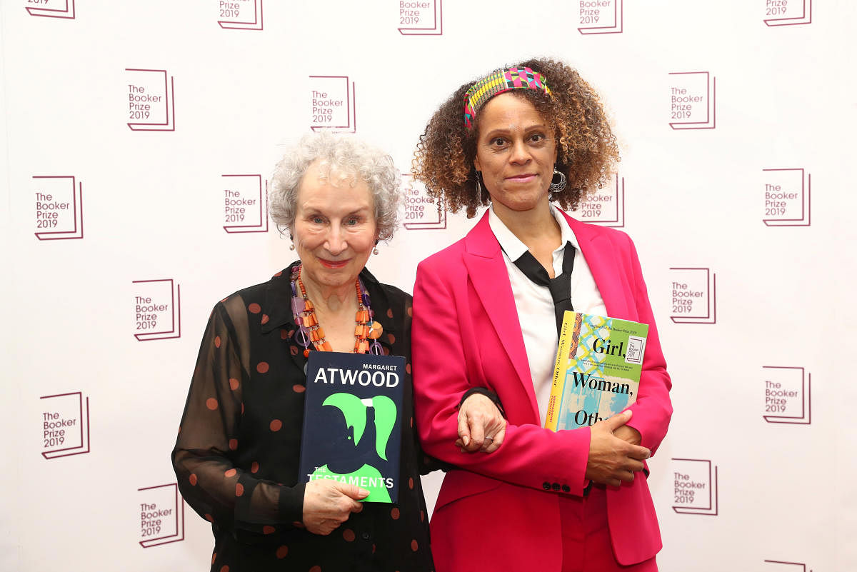 Margaret Atwood poses with Bernardine Evaristo after jointly winning the Booker Prize for Fiction 2019 at the Guildhall in London, Britain October 14, 2019. (REUTERS)