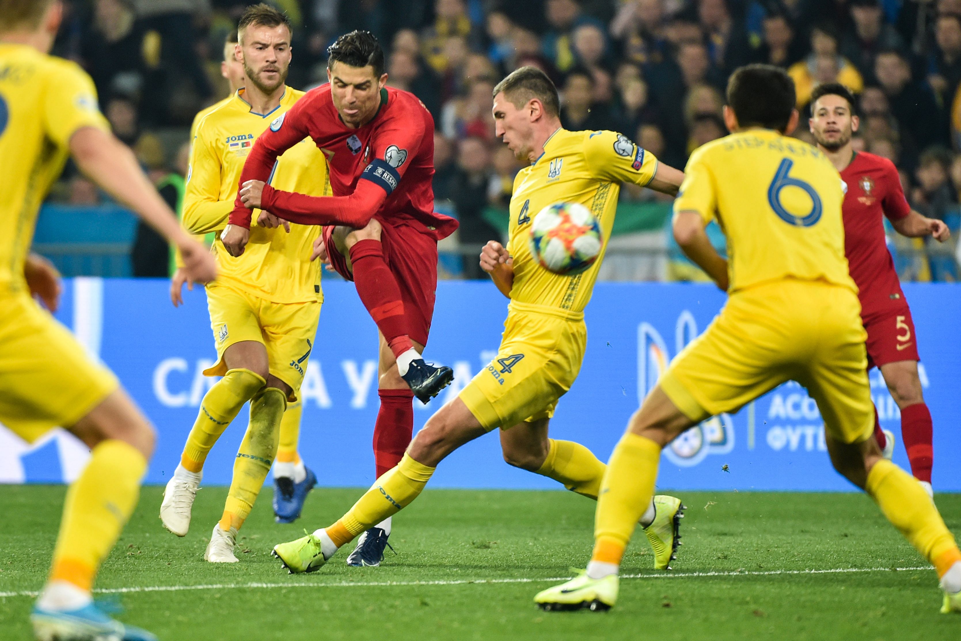 Portugal's forward Cristiano Ronaldo kicks the ball during the Euro 2020 football qualification match between Ukraine and Portugal at the NSK Olimpiyskyi stadium in Kiev. (AFP Photo)