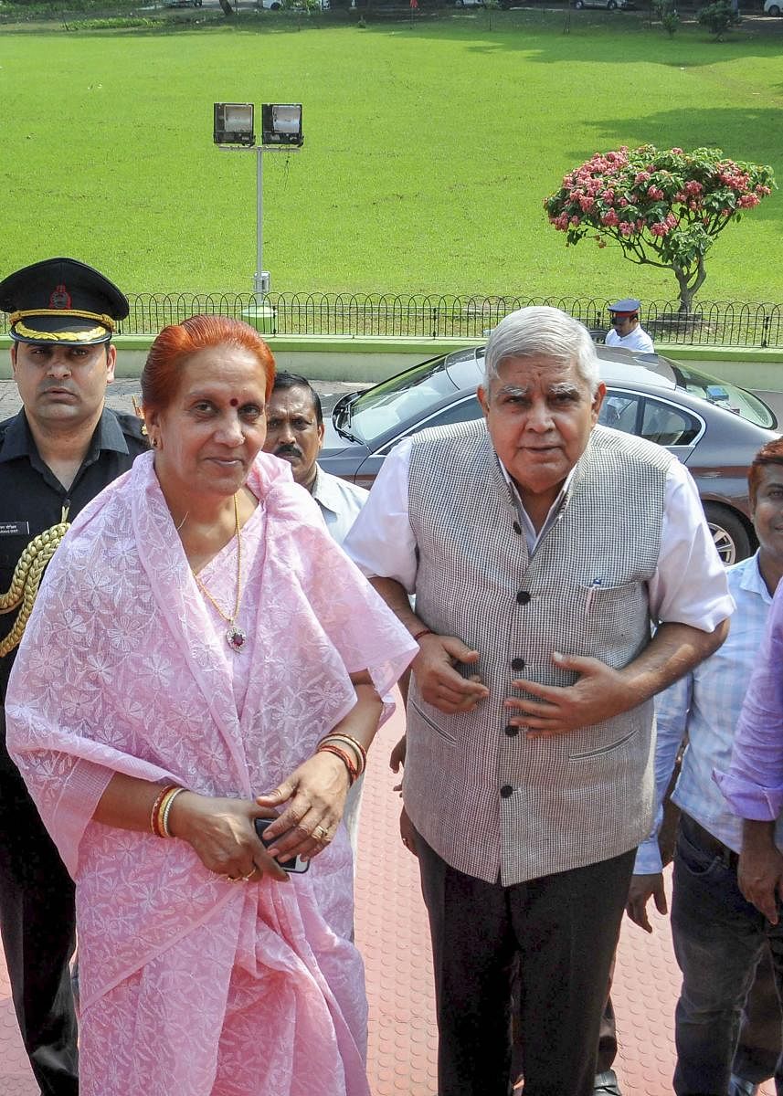 West Bengal Governor Jagdeep Dhankhar (R) with his wife Sudesh Dhankhar during their visit to National Library, in Kolkata on Tuesday. (PTI Photo)