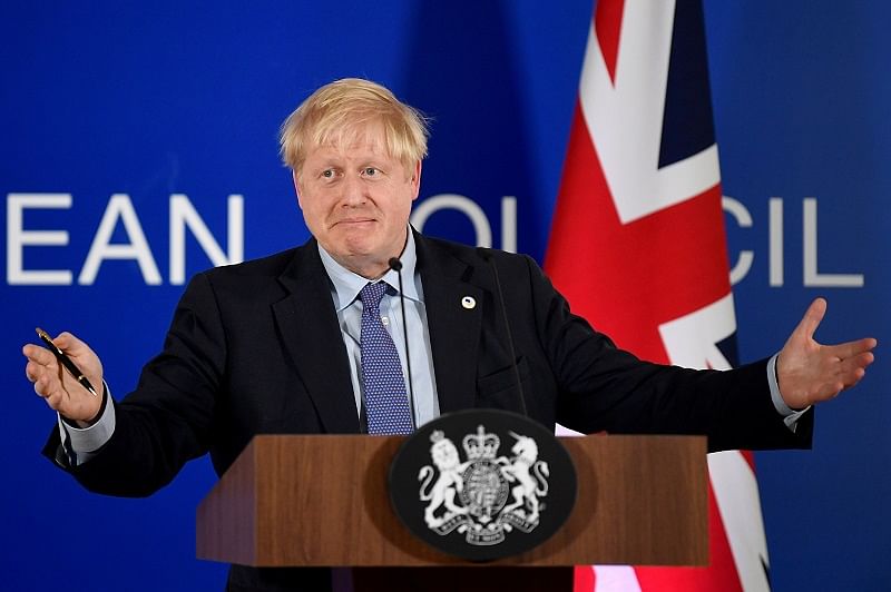 Britain's Prime Minister Boris Johnson attends a news conference at the European Union leaders summit dominated by Brexit, in Brussels, Belgium. (Reuters Photo)